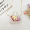 Pink floral crossbody bag for girls with 3D fabric flowers and pearl handle - Pink
