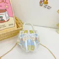Light blue floral embroidered crossbody bag with pearl handle and silk tassels - White