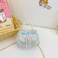 Blue mini handbag for girls with floral embroidery and pearl tassel handle details - Blue Single Breasted