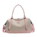 Cream canvas travel bag with pink leather trim and adjustable shoulder strap - Pink