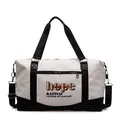 Grote beige en zwarte reistas met hope-belettering en verstelbare schouderriem - Off-wit