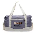 Grote reistas in paars en beige met verstelbare schouderriem en 'hope' opdruk - Blauw