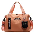 Large apricot travel tote bag with cute cat charm and adjustable shoulder strap - With Charm / Orange