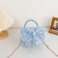 Bolso de lentejuelas azul claro para niña con asa de perlas y lazo de malla - Perla azul