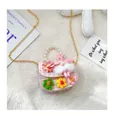 Detail of pink tweed girl's bag with knit flowers, pearl handle, and plush bunny charm - Flower Style / Pink