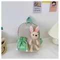Detail of cute pink and green plaid kids backpack with a plush bunny and side pouch - Rabbit Series / Green