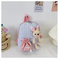 Detail view of pink and blue checkered kids backpack featuring a cute plush bunny and drawstring pocket - Rabbit Series / Pink