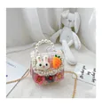 Close-up of pink tweed kids crossbody bag with pearl handle and plush rabbit decor - Carrot Style / Pink
