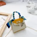 Mini borsa Kelly bicolore giallo e bianco con manico in seta e tracolla a catena - Giallo