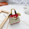 Mini borsa stile Kelly bicolore rosso e bianco con manico in foulard e catena dorata - Rosso