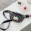 Blue black and pink checkerboard kids chest bag with yellow charm and ADDR patch - Pink