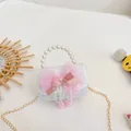 White lace crossbody bag for girls with pearl handle and pink bow accents - White Bowknot