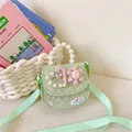 Mint green girls crossbody bag with pearl handle, floral decor and heart sequin details - Green-Hearts
