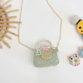 Mini green quilted girls' handbag with pearl handle and floral decoration - Perfume Green