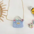 Mini light blue textured girls handbag with pearl handle and floral decoration - Floral Blue