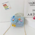 Sparkly light blue sequin mini handbag for girls with pearl handle and chain strap - Type 1 Monster Bird / Blue