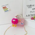 Pink sequin mini crossbody bag with pearl handle, plush doll charm and gold chain strap - Type 1 Monster Bird / Rose Red