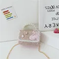 Pink sequin girls' handbag with pearl handle, lace trim, and golden chain strap - Type 2 Swan with No 5 Bottle / Pink