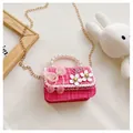 Detail of pink tweed girl's bag with pearl handle, lace trim, and lovely bow decoration - Flower Bow / Rose Red