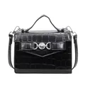 Glossy black crocodile pattern handbag for women with silver heart buckle on white background - Black