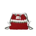 Bolso saco rojo de punto hecho a mano con patrones de tulipanes y cordón verde - Rojo