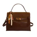 Brown vintage textured leather handbag with colorful wooden beads and metallic clasp - Brown (With Charm)