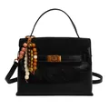 Black cracked oil wax leather handbag with gold arch lock and ethnic beaded charm - Black (with Pendant)