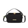 Schwarze Handtasche aus Wildlederimitat mit goldener Schnalle und Lederriemen - Schwarz