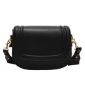 Classic black leather saddle bag with decorative stitching and gold metal hardware - Black