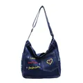 Donkerblauwe denim crossbodytas met vintage borduursel en verstelbare riem - Donkerblauw