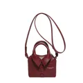 Mini burgundy crossbody bag featuring creative shirt collar design and decorative buttons - Red