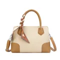 Beige woven handbag with brown leather trim, adjustable strap, and stylish silk scarf - Khaki