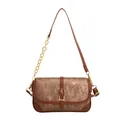 Vintage brown shoulder bag with vertical texture and gold buckle in a minimalist style - Brown