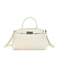 Creamy beige crossbody bag featuring elegant diamond quilted texture and metal clasp - Beige