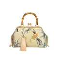 Champagne gold shell bag with bamboo handle, butterfly embroidery, and silk tassel - Off White