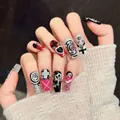 Uñas postizas punk gothic con cruces 3D, pinchos y perlas para estilo Y2K rebelde - Extra Pequeño (XS)