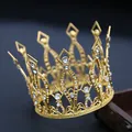Close-up of golden crown featuring intricate hollow metal work and sparkling rhinestones - Large Rhombus Style (1125) / Gold White Zirconia
