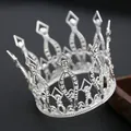 Macro detail of silver alloy crown featuring intricate geometric hollow diamond patterns - Silver White Rhinestone