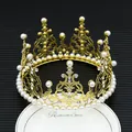 Macro detail of gold-plated crown with pearls and rhinestones on a ceramic display - Round Gold Iron