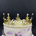 Elegant gold hollow metal cake crown topper with white imitation pearls on a cake - No Stone Style / Gold