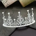 Elegant silver tiara crown with intricate hollow patterns and white pearls for cake decor - Multi-Rhinestone Style / Silver