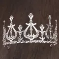 Elegant vintage silver bridal tiara with sparkling crystal rhinestones on wood texture - Silver