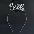 Detail of silver Bride headband featuring openwork lettering and diamond icon on black base - No Rhinestones / Silver