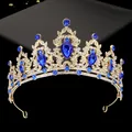 Detailed macro view of gold alloy tiara with blue teardrop stones and sparkling crystals - Gold with Royal Blue Rhinestone
