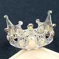 Silver crown headpiece with white pearls and iridescent rhinestones on a dark background - S / Silver
