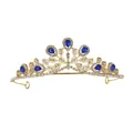 Detailed close-up of golden crown with blue teardrop crystals and white rhinestones - Gold Tone + Royal Blue