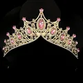 Detail of vintage gold bridal crown with pink crystals and shimmering white rhinestones - Pink