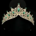 Elegant gold bridal crown with emerald crystals and white rhinestones on black background - Green