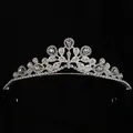Silver alloy bridal crown with sparkling rhinestones and drop gems on black backdrop - Silver
