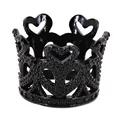 Detailed view of mini black alloy cake crown with heart patterns and beaded textures - Black